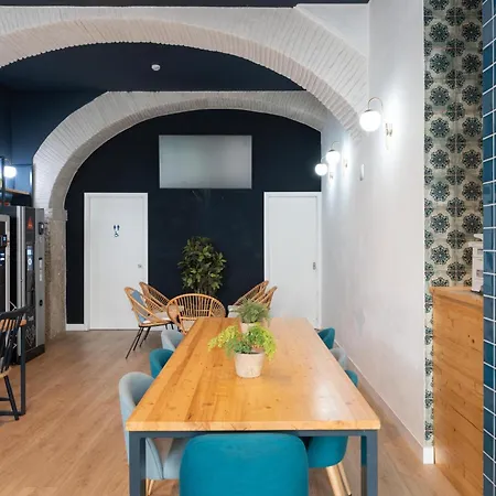 אכסניה The House Baixa